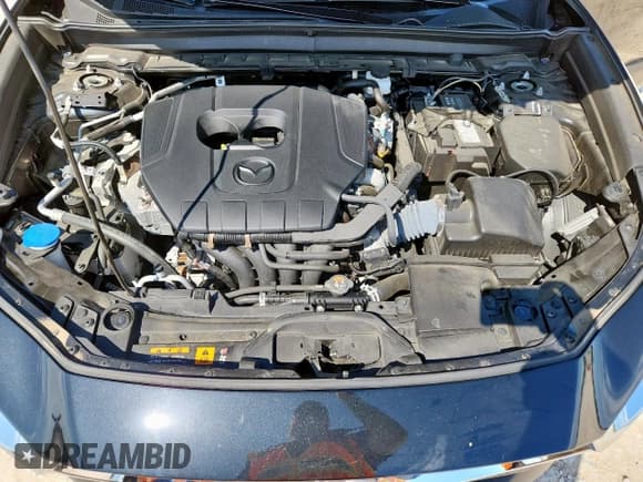 ✅ 2023 Mazda CX-30 S Premium • VIN: 3MVDMBDM4PM546563 • Lot: 67591215. Listed on Copart with 10,757 mi. Free auction sales archive from the USA and detailed vehicle history report at DreamBid. Image 12.