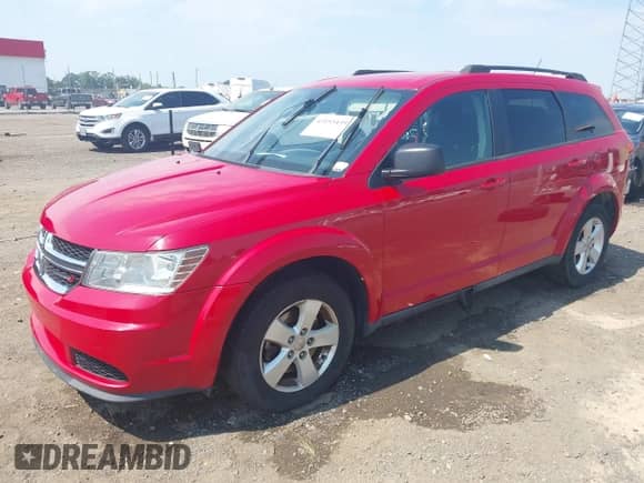 2013 Dodge Journey American Value with VIN 3C4PDCAB7DT500881, listed as a IAAI auction lot 43193439 with 165,029 mi miles and . Bid and sale history available at DreamBid. Image 18.