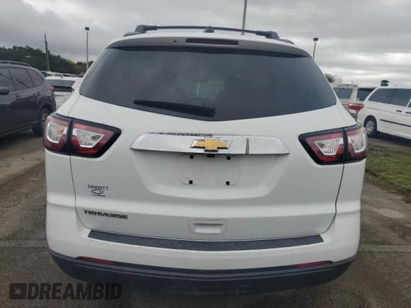 ✅ 2017 Chevrolet Traverse LS • VIN: 1GNKRFKD8HJ137573 • Lot: 74602644. Wystawiony na Copart z przebiegiem Nie podano. Bezpłatny archiwum sprzedaży aukcyjnych z USA i szczegółowy raport historii pojazdu na DreamBid. Zdjęcie 6.
