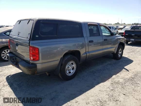 2008 Dodge Dakota ST с VIN 1D7HE28KX8S507189, выставлен на аукционе Copart как лот 63728594 с пробегом 171 162 миль миль и Списание • Salvage title. История ставок и продаж доступна на DreamBid. Изображение 3.