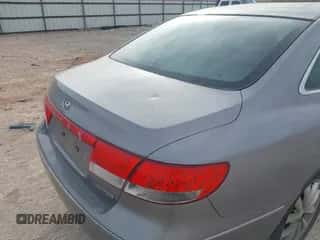 2007 Hyundai Azera SE z VIN KMHFC46F17A194011, wystawiony jako IAAI lot #41863372 z przebiegiem 161 904 mil mil oraz . Historia ofert i sprzedaży dostępna na DreamBid. Obrazek 6.