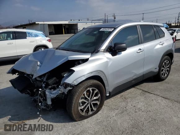 ✅ 2023 Toyota Corolla Cross Hybrid S • VIN: 7MUFBABG5PV017023 • Lot: 90942025. Listed on Copart with 18,740 mi. Free auction sales archive from the USA and detailed vehicle history report at DreamBid. Image 1.