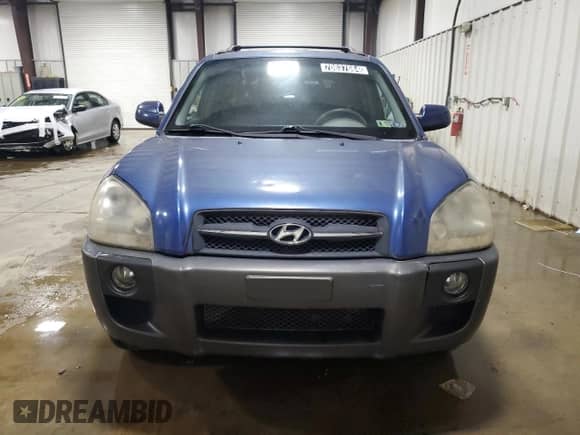2007 Hyundai Tucson SE z VIN KM8JN72D97U588767, wystawiony jako Copart lot #70637684 z przebiegiem 133 343 mil mil oraz Czysty tytuł • Clean title. Historia ofert i sprzedaży dostępna na DreamBid. Obrazek 5.