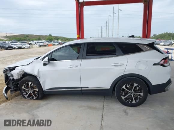 ✅ 2023 Kia Sportage EX • VIN: 5XYK33AFXPG026873 • Lot: 43644966. Listed on IAAI with 62,856 mi. Free auction sales archive from the USA and detailed vehicle history report at DreamBid. Image 15.