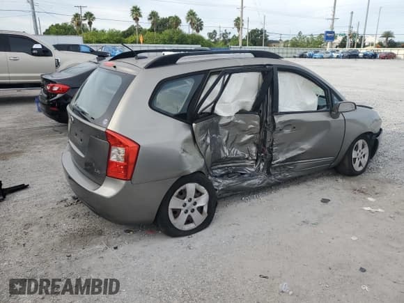 ✅ 2009 Kia Rondo LX • VIN: KNAFG528497248890 • Lot: 81419495. Wystawiony na Copart z przebiegiem 129 627 mil. Bezpłatny archiwum sprzedaży aukcyjnych z USA i szczegółowy raport historii pojazdu na DreamBid. Zdjęcie 3.