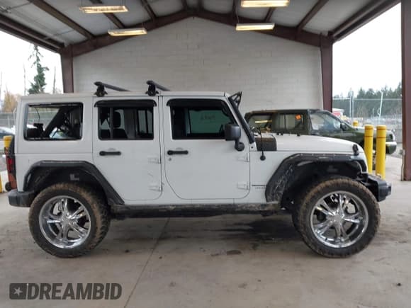 ✅ 2018 Jeep Wrangler Unlimited Sport S • VIN: 1C4BJWDGXJL886151 • Лот: 43720349. Опубликован ранее на IAAI с пробегом 50 712 миль. Бесплатный доступ к архиву аукционных продаж из США и подробный отчёт об истории автомобиля на DreamBid. Изображение 14.