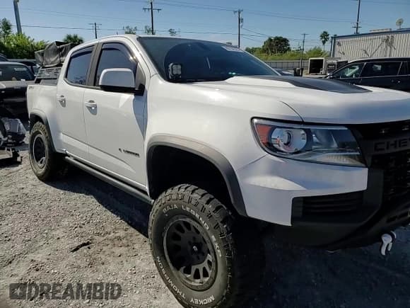 ✅ 2021 Chevrolet Colorado 4WD ZR2 • VIN: 1GCGTEEN4M1118852 • Lot: 90738525. Listed on Copart with 57,185 mi. Free auction sales archive from the USA and detailed vehicle history report at DreamBid. Image 14.
