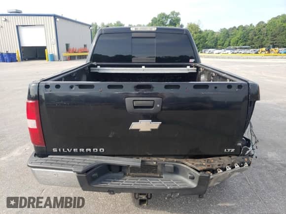 2007 Chevrolet Silverado 1500 LTZ with VIN 2GCEK13M671558499, listed as a Copart auction lot 57407085 with 195,637 mi miles and Salvage title. Bid and sale history available at DreamBid. Image 6.