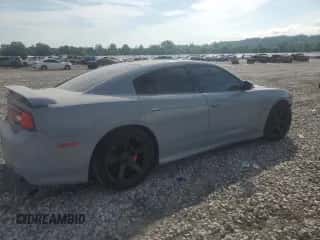 2013 Dodge Charger SRT-8 z VIN 2C3CDXEJ9DH521185, wystawiony jako Copart lot #65207205 z przebiegiem 69 215 mil mil oraz Szkoda całkowita • Salvage title. Historia ofert i sprzedaży dostępna na DreamBid. Obrazek 3.