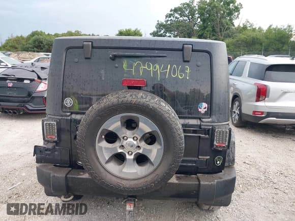 ✅ 2018 Jeep Wrangler Sahara • VIN: 1C4AJWBG4JL852964 • Lot: 42994067. Listed on IAAI with Not provided. Free auction sales archive from the USA and detailed vehicle history report at DreamBid. Image 16.