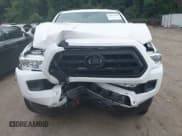 ✅ 2020 Toyota Tacoma SR • VIN: 3TYSX5EN1LT000276 • Lot: 42673254. Listed on IAAI with 57,374 mi. Free auction sales archive from the USA and detailed vehicle history report at DreamBid. Image 6.