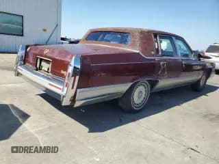 ✅ 1992 Cadillac Brougham • VIN: 1G6DW5475NR702129 • Лот: 82149895. Опубликован ранее на Copart с пробегом 219 029 миль. Бесплатный доступ к архиву аукционных продаж из США и подробный отчёт об истории автомобиля на DreamBid. Изображение 3.