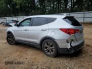 ✅ 2014 Hyundai Santa Fe • VIN: 5XYZU3LB7EG206492 • Лот: 69850035. Опубликован ранее на Copart с пробегом Не указан. Бесплатный доступ к архиву аукционных продаж из США и подробный отчёт об истории автомобиля на DreamBid. Изображение 2.