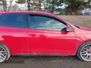 ✅ 2012 Volkswagen Golf GTI w/Conv & Sunroof • VIN: WVWEV7AJ9CW292286 • Lot: 41478359. Listed on IAAI with 153,000 mi. Free auction sales archive from the USA and detailed vehicle history report at DreamBid. Image 13.