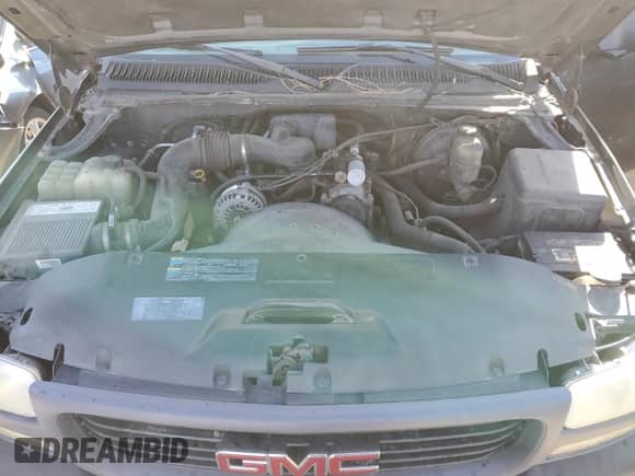 2002 GMC Sierra 1500 z VIN 1GTEC14W92Z280310, wystawiony jako Copart lot #74731204 z przebiegiem 241 075 mil mil oraz Szkoda całkowita • Salvage title. Historia ofert i sprzedaży dostępna na DreamBid. Obrazek 12.