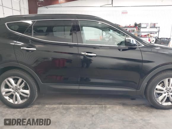 ✅ 2013 Hyundai Santa Fe Sport • VIN: 5XYZUDLA6DG121560 • Лот: 43672701. Опубликован ранее на IAAI с пробегом 93 347 миль. Бесплатный доступ к архиву аукционных продаж из США и подробный отчёт об истории автомобиля на DreamBid. Изображение 13.