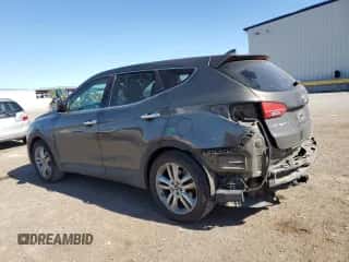2013 Hyundai Santa Fe Sport z VIN 5XYZW3LA7DG045304, wystawiony jako Copart lot #89658015 z przebiegiem 147 599 mil mil oraz Szkoda całkowita • Salvage title. Historia ofert i sprzedaży dostępna na DreamBid. Obrazek 2.