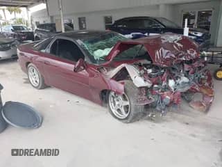 2002 Chevrolet Camaro Z28 z VIN 2G1FP22G922134995, wystawiony jako IAAI lot #42757854 z przebiegiem 66 474 mil mil oraz . Historia ofert i sprzedaży dostępna na DreamBid. Obrazek 1.