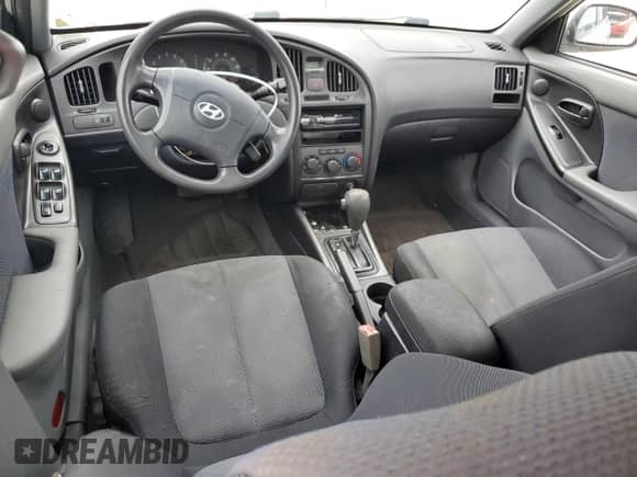 2005 Hyundai Elantra GLS z VIN KMHDN56D65U136462, wystawiony jako Copart lot #79910974 z przebiegiem 146 142 mil mil oraz Czysty tytuł • Clean title. Historia ofert i sprzedaży dostępna na DreamBid. Obrazek 8.