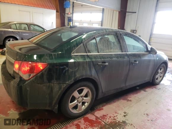 ✅ 2015 Chevrolet Cruze LT • VIN: 1G1PC5SB1F7186979 • Lot: 39162973. Listed on Copart with 130,583 mi. Free auction sales archive from the USA and detailed vehicle history report at DreamBid. Image 3.