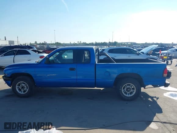 ✅ 1999 Dodge Dakota SLT • VIN: 1B7GL22Y9XS307637 • Lot: 43460284. Wystawiony na IAAI z przebiegiem 321 999 mil. Bezpłatny archiwum sprzedaży aukcyjnych z USA i szczegółowy raport historii pojazdu na DreamBid. Zdjęcie 14.