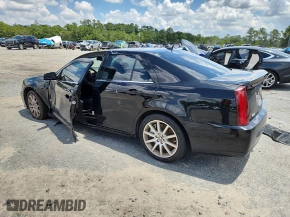 ✅ 2006 Cadillac STS-V • VIN: 1G6DX67D460215899 • Lot: 65453005. Wystawiony na Copart z przebiegiem 140 509 mil. Bezpłatny archiwum sprzedaży aukcyjnych z USA i szczegółowy raport historii pojazdu na DreamBid. Zdjęcie 2.
