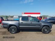 ✅ 2011 Toyota Tacoma PreRunner • VIN: 3TMJU4GN0BM110452 • Lot: 43183116. Listed on IAAI with 233,826 mi. Free auction sales archive from the USA and detailed vehicle history report at DreamBid. Image 13.