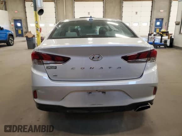 2018 Hyundai Sonata SE с VIN 5NPE24AF5JH611575, выставлен на аукционе Copart как лот 90310695 с пробегом 86 940 миль миль и Списание • Salvage title. История ставок и продаж доступна на DreamBid. Изображение 6.