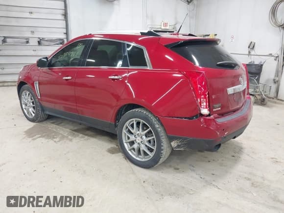 ✅ 2014 Cadillac SRX Performance Collection • VIN: 3GYFNCE30ES596415 • Lot: 42329771. Listed on IAAI with 71,620 mi. Free auction sales archive from the USA and detailed vehicle history report at DreamBid. Image 3.