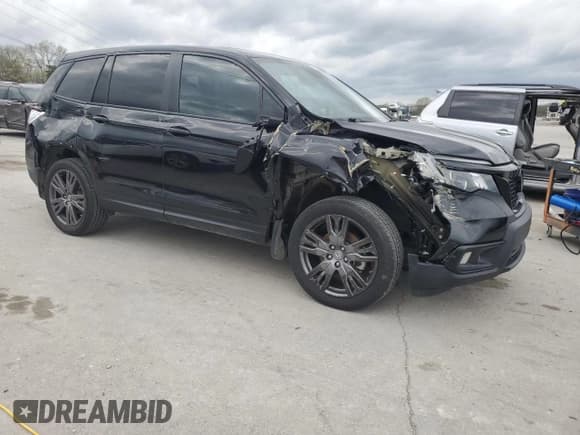 ✅ 2021 Honda Passport EX-L • VIN: 5FNYF8H58MB040933 • Lot: 51067505. Listed on Copart with 64,963 mi. Free auction sales archive from the USA and detailed vehicle history report at DreamBid. Image 4.