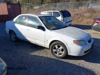 ✅ 2001 Mazda Protege LX • VIN: JM1BJ225710406286 • Lot: 41887127. Wystawiony na IAAI z przebiegiem Nie podano. Bezpłatny archiwum sprzedaży aukcyjnych z USA i szczegółowy raport historii pojazdu na DreamBid. Zdjęcie 1.