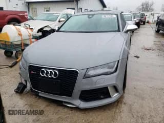 ✅ 2014 Audi RS 7 Prestige • VIN: WUAW2AFCXEN902390 • Лот: 40151564. Опубликован ранее на Copart с пробегом 101 392 миль. Бесплатный доступ к архиву аукционных продаж из США и подробный отчёт об истории автомобиля на DreamBid. Изображение 5.