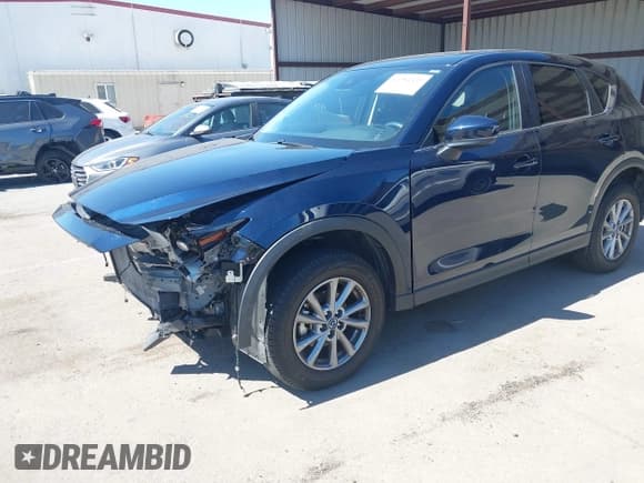 ✅ 2023 Mazda CX-5 S Carbon Edition • VIN: JM3KFBCMXP0282649 • Lot: 42784337. Listed on IAAI with 25,589 mi. Free auction sales archive from the USA and detailed vehicle history report at DreamBid. Image 6.