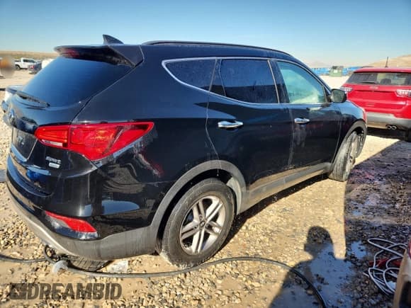 ✅ 2017 Hyundai Santa Fe 2.4L • VIN: 5XYZUDLB3HG462560 • Lot: 89849245. Listed on Copart with 76,475 mi. Free auction sales archive from the USA and detailed vehicle history report at DreamBid. Image 3.