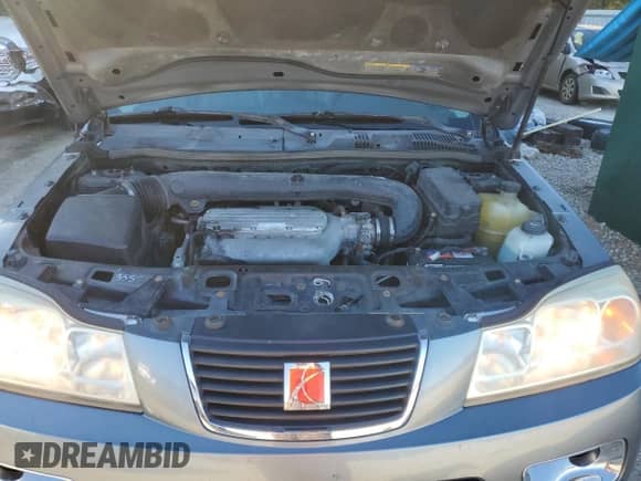 2006 Saturn VUE z VIN 5GZCZ53406S854366, wystawiony jako Copart lot #81477114 z przebiegiem 155 387 mil mil oraz Szkoda całkowita • Salvage title. Historia ofert i sprzedaży dostępna na DreamBid. Obrazek 12.