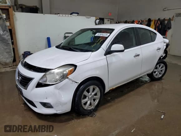 ✅ 2012 Nissan Versa SV • VIN: 3N1CN7AP1CL818012 • Lot: 52804225. Listed on Copart with 194,070 mi. Free auction sales archive from the USA and detailed vehicle history report at DreamBid. Image 1.