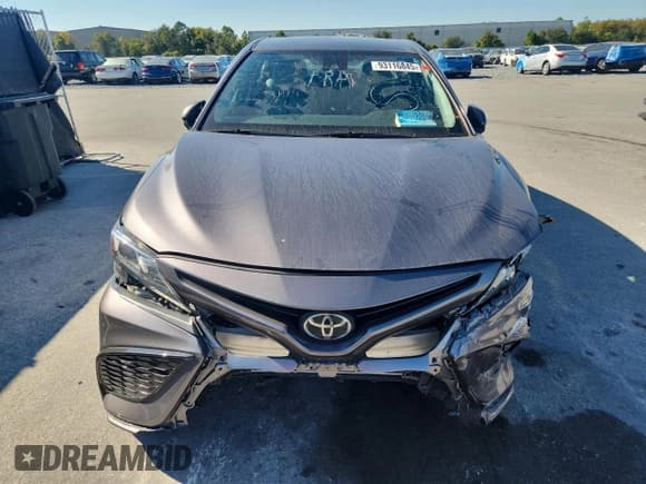 ✅ 2022 Toyota Camry SE • VIN: 4T1G11AK4NU046069 • Лот: 93116845. Опубликован ранее на Copart с пробегом 143 957 миль. Бесплатный доступ к архиву аукционных продаж из США и подробный отчёт об истории автомобиля на DreamBid. Изображение 5.