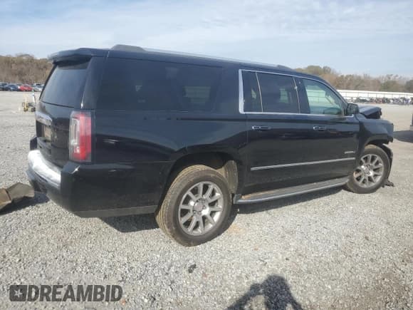 ✅ 2020 GMC Yukon XL Denali • VIN: 1GKS1HKJ0LR182572 • Lot: 80741994. Listed on Copart with 107,195 mi. Free auction sales archive from the USA and detailed vehicle history report at DreamBid. Image 3.