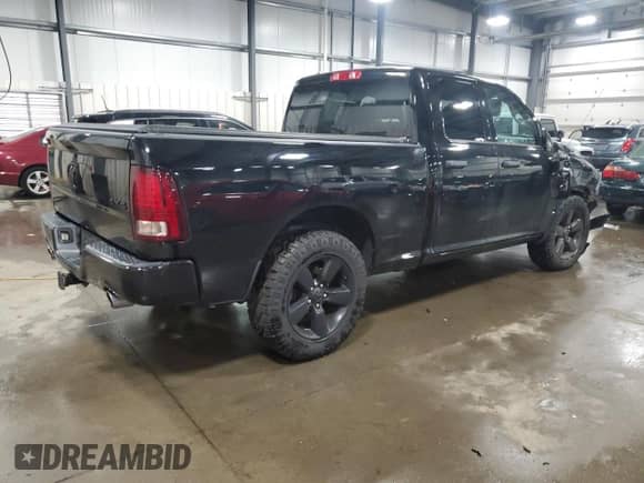 2015 Ram 1500 Tradesman with VIN 1C6RR7FT7FS550873, listed as a Copart auction lot 64382985 with 149,983 mi miles and Salvage title. Bid and sale history available at DreamBid. Image 3.