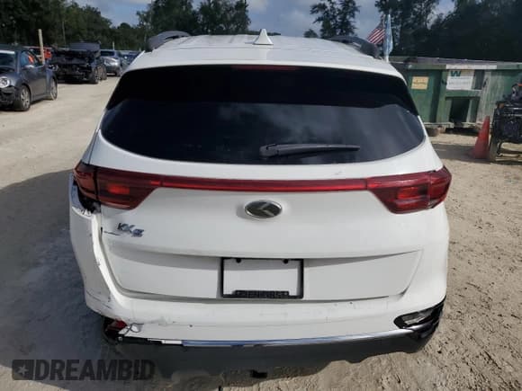 ✅ 2021 Kia Sportage LX • VIN: KNDPM3AC0M7895936 • Lot: 85743935. Wystawiony na Copart z przebiegiem 63 526 mil. Bezpłatny archiwum sprzedaży aukcyjnych z USA i szczegółowy raport historii pojazdu na DreamBid. Zdjęcie 6.