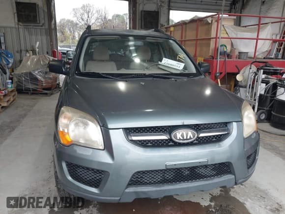 ✅ 2009 Kia Sportage EX • VIN: KNDJF723397563597 • Лот: 43800554. Опубликован ранее на IAAI с пробегом 196 423 миль. Бесплатный доступ к архиву аукционных продаж из США и подробный отчёт об истории автомобиля на DreamBid. Изображение 6.