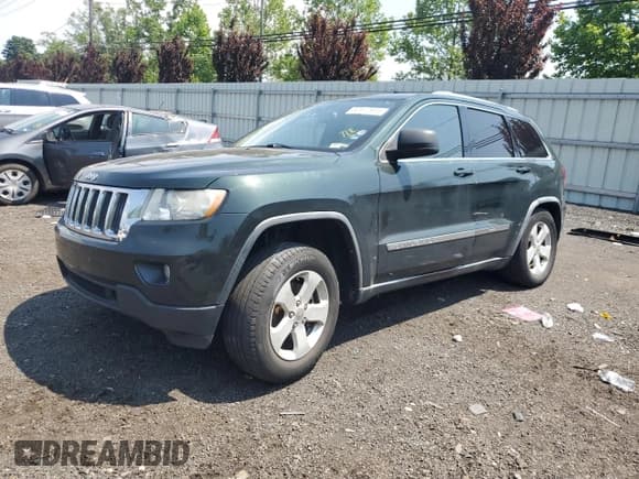 ✅ 2011 Jeep Grand Cherokee Laredo • VIN: 1J4RR4GG4BC673652 • Lot: 60517935. Listed on Copart with 93,468 mi. Free auction sales archive from the USA and detailed vehicle history report at DreamBid. Image 1.