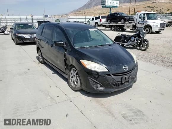 ✅ 2012 Mazda 5 Grand Touring • VIN: JM1CW2DL1C0136900 • Лот: 68957565. Опубликован ранее на Copart с пробегом 185 744 миль. Бесплатный доступ к архиву аукционных продаж из США и подробный отчёт об истории автомобиля на DreamBid. Изображение 14.