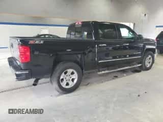 2014 Chevrolet Silverado 1500 LTZ с VIN 3GCUKSEC4EG107419, выставлен на аукционе Copart как лот 80618145 с пробегом 142 763 миль миль и Списание • Salvage title. История ставок и продаж доступна на DreamBid. Изображение 3.