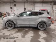 ✅ 2017 Hyundai Santa Fe 2.4L • VIN: 5NMZTDLB9HH000738 • Lot: 43829716. Listed on IAAI with 154,400 mi. Free auction sales archive from the USA and detailed vehicle history report at DreamBid. Image 14.