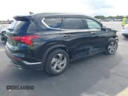 ✅ 2022 Hyundai Santa Fe SEL • VIN: 5NMS34AJ3NH404867 • Lot: 43484971. Listed on IAAI with 163,193 mi. Free auction sales archive from the USA and detailed vehicle history report at DreamBid. Image 4.