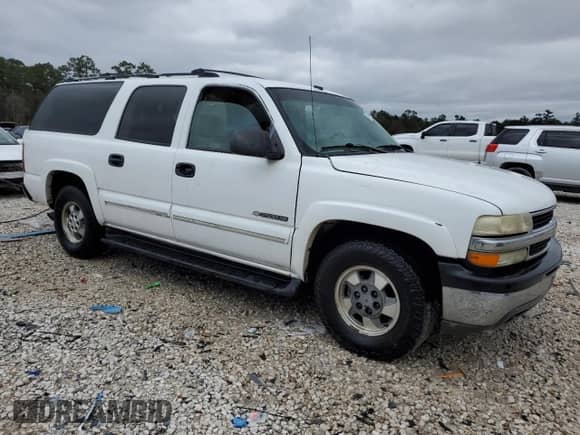 ✅ 2001 Chevrolet Suburban • VIN: 1GNEC16T71J293421 • Лот: 87670365. Опубликован ранее на Copart с пробегом 310 325 миль. Бесплатный доступ к архиву аукционных продаж из США и подробный отчёт об истории автомобиля на DreamBid. Изображение 4.