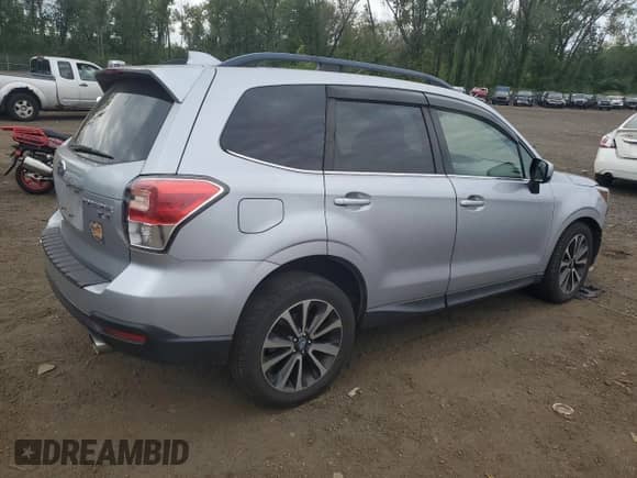 2017 Subaru Forester Premium with VIN JF2SJGECXHH537197, listed as a Copart auction lot 70521415 with 105,322 mi miles and Salvage title. Bid and sale history available at DreamBid. Image 3.