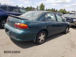 2000 Chevrolet Malibu LS z VIN 1G1NE52J4Y6330137, wystawiony jako Copart lot #64896574 z przebiegiem 161 842 mil mil oraz Czysty tytuł • Clean title. Historia ofert i sprzedaży dostępna na DreamBid. Obrazek 3.
