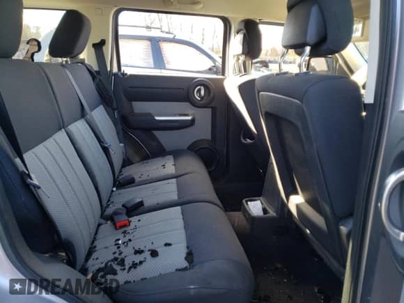 2010 Dodge Nitro SXT z VIN 1D4PU5GK3AW134705, wystawiony jako Copart lot #79857434 z przebiegiem Nie podano mil oraz Szkoda całkowita • Salvage title. Historia ofert i sprzedaży dostępna na DreamBid. Obrazek 11.